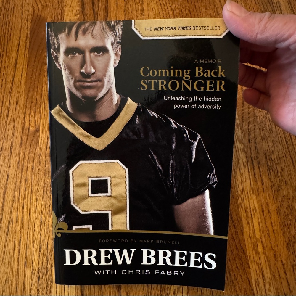 DREW BREES’ signed paperback book entitled Coming Back Stronger
